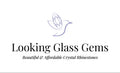 Logo for Looking Glass Gems with a crystal design on a white background